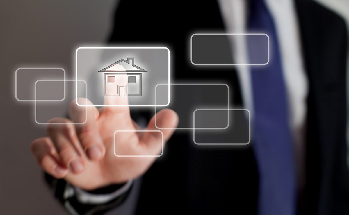 Real estate investor using technology to buy houses
